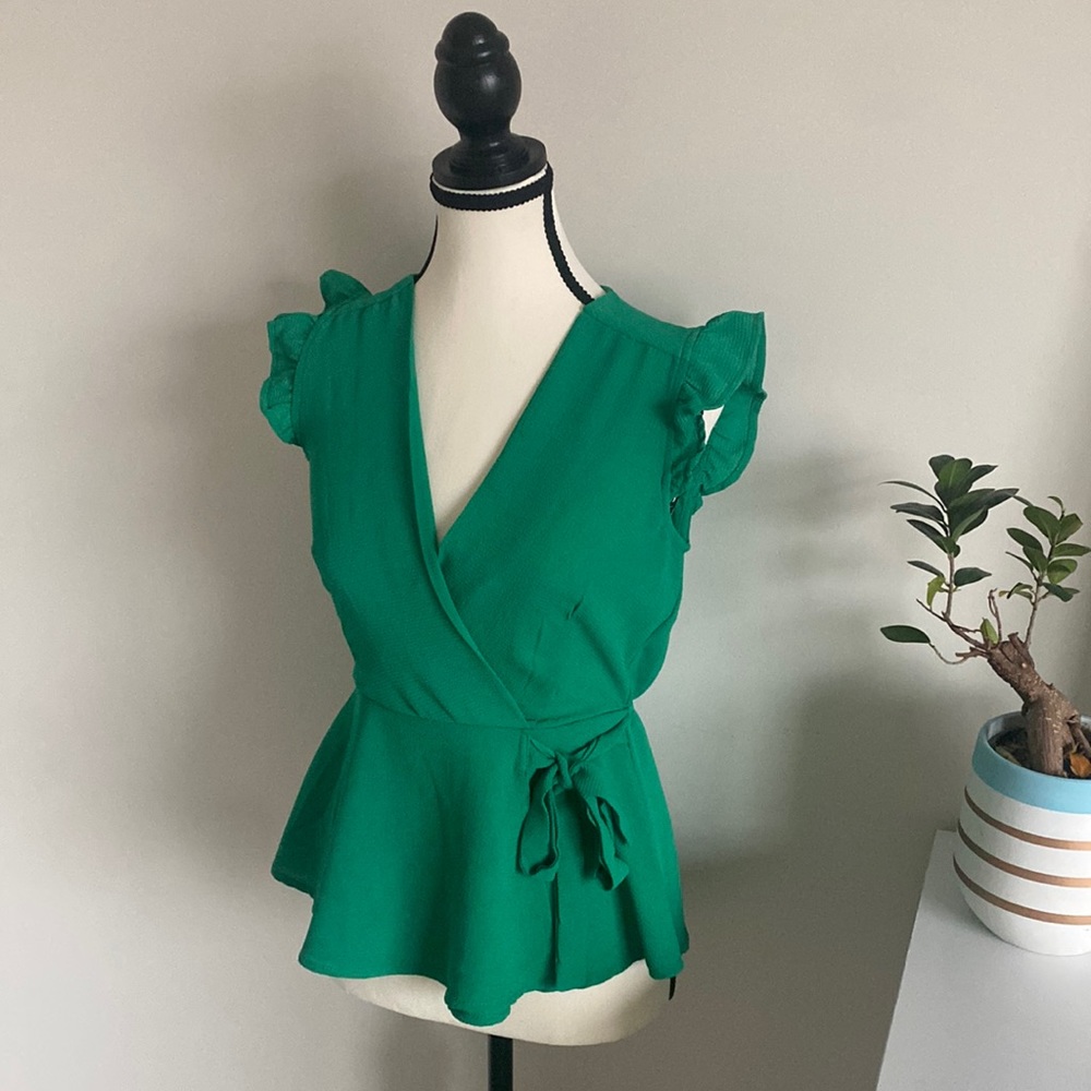 Green peplum blouse
